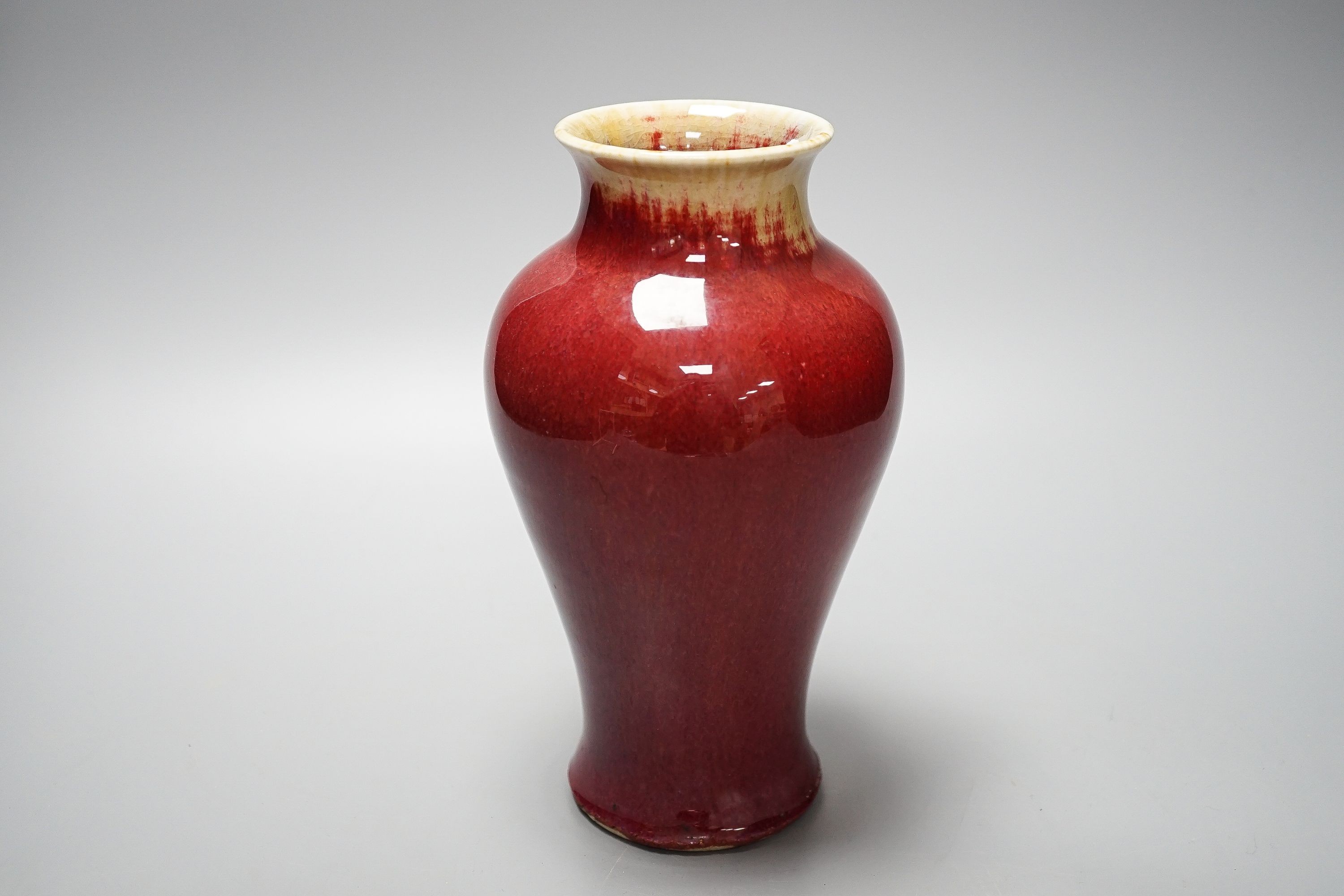 A Chinese sang de boeuf glazed vase 22cm
